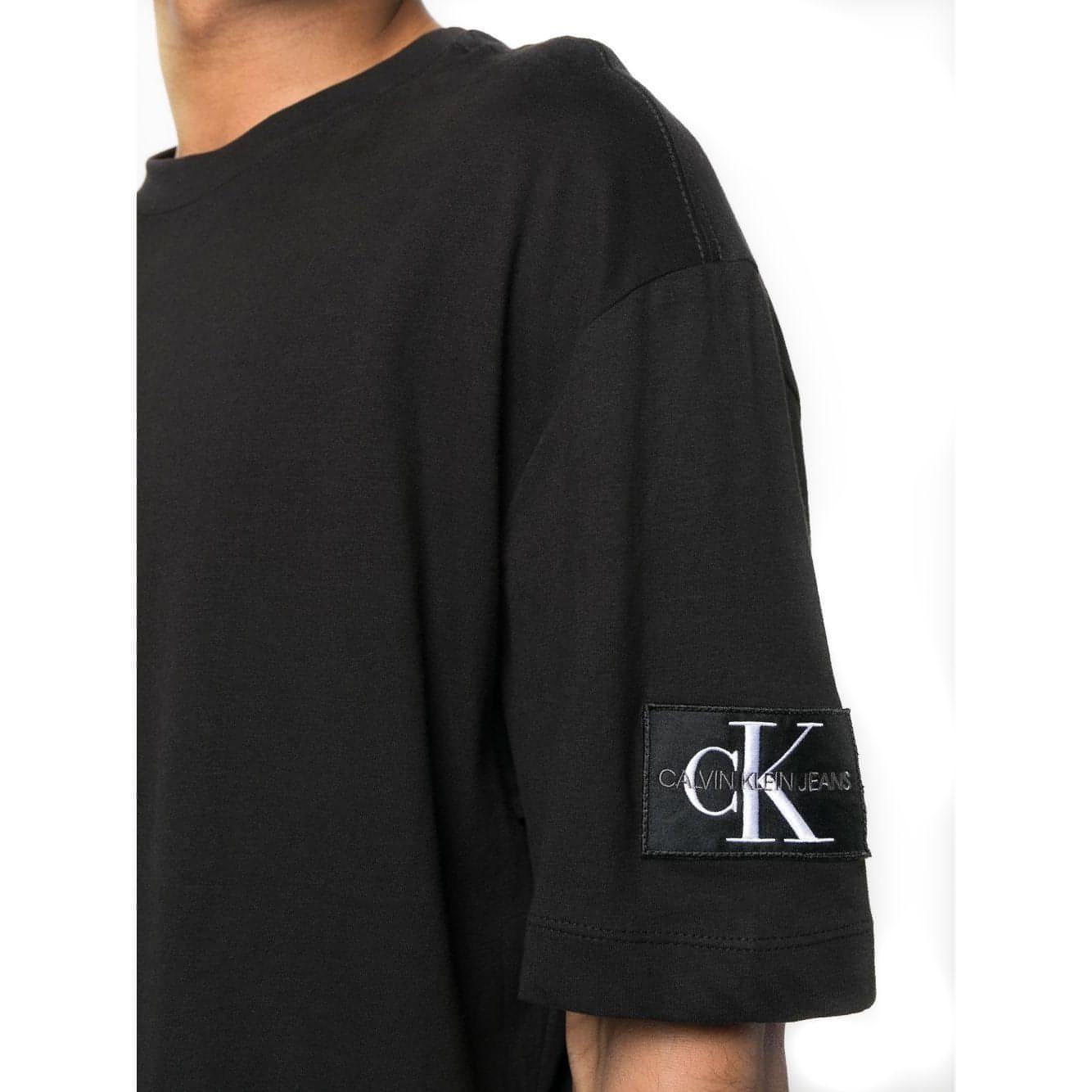 CALVIN KLEIN JEANS vyriški juodi marškinėliai Monologo t-shirt
